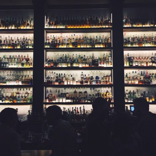 bottles-on-lit-up-shelves_t20_JlbV0P